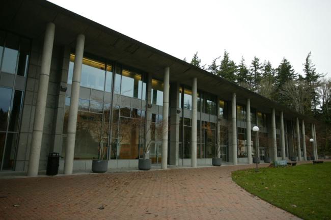 Science lecture building exterior, a two story building with floor to ceiling windows