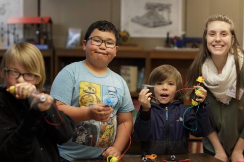 WWU student and Elementary Students show off their circuit design skills
